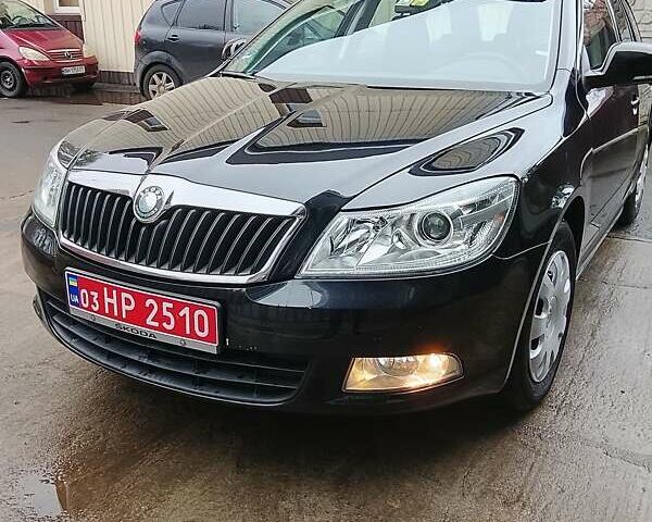 Черный Шкода Октавия, объемом двигателя 1.4 л и пробегом 233 тыс. км за 6950 $, фото 1 на Automoto.ua