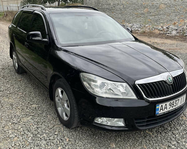 Черный Шкода Октавия, объемом двигателя 1.6 л и пробегом 285 тыс. км за 7650 $, фото 1 на Automoto.ua