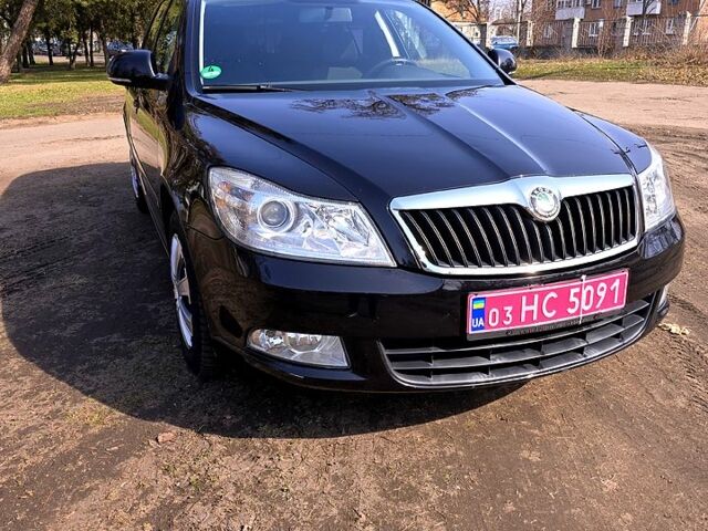 Черный Шкода Октавия, объемом двигателя 18 л и пробегом 200 тыс. км за 7200 $, фото 1 на Automoto.ua