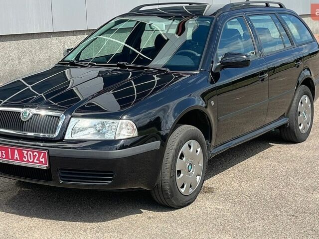 Черный Шкода Октавия, объемом двигателя 1.6 л и пробегом 179 тыс. км за 5800 $, фото 1 на Automoto.ua