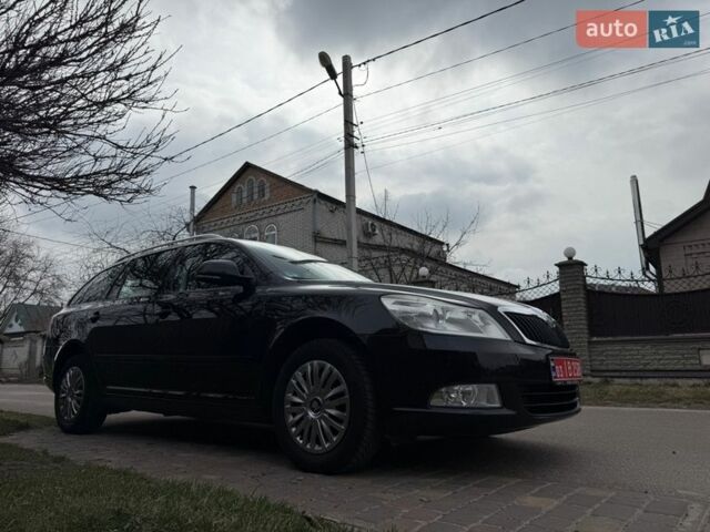 Чорний Шкода Октавія, об'ємом двигуна 1.8 л та пробігом 189 тис. км за 7500 $, фото 1 на Automoto.ua