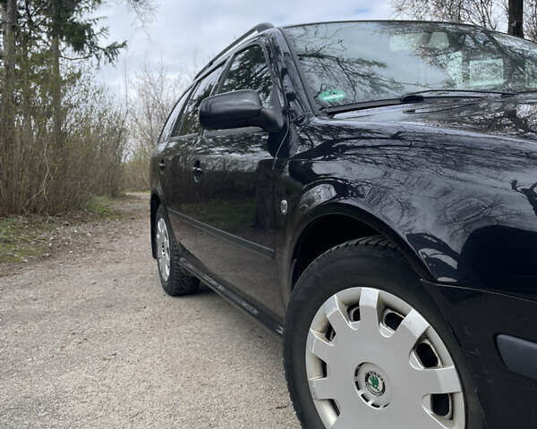 Чорний Шкода Октавія, об'ємом двигуна 1.6 л та пробігом 196 тис. км за 5800 $, фото 1 на Automoto.ua