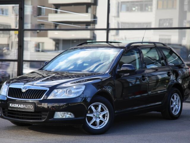 Чорний Шкода Октавія, об'ємом двигуна 1.6 л та пробігом 230 тис. км за 7501 $, фото 1 на Automoto.ua