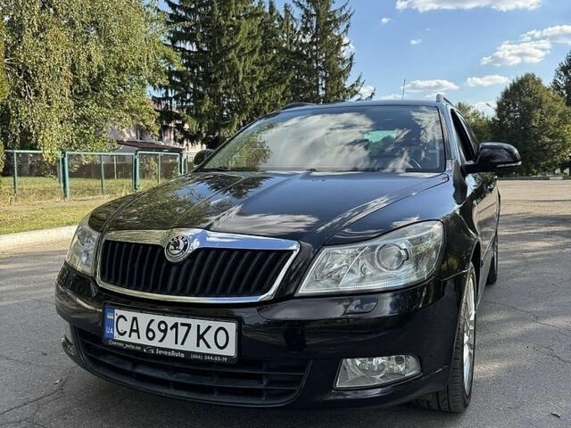 Черный Шкода Октавия, объемом двигателя 1.8 л и пробегом 231 тыс. км за 6821 $, фото 1 на Automoto.ua