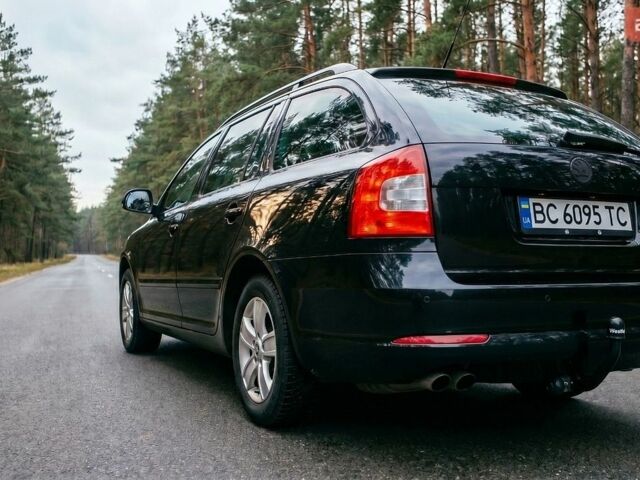 Черный Шкода Октавия, объемом двигателя 1.8 л и пробегом 185 тыс. км за 7500 $, фото 1 на Automoto.ua