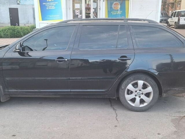 Чорний Шкода Октавія, об'ємом двигуна 1.6 л та пробігом 215 тис. км за 8300 $, фото 1 на Automoto.ua