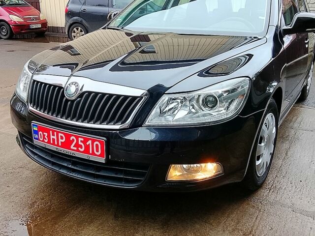Черный Шкода Октавия, объемом двигателя 1.4 л и пробегом 23300 тыс. км за 6900 $, фото 1 на Automoto.ua