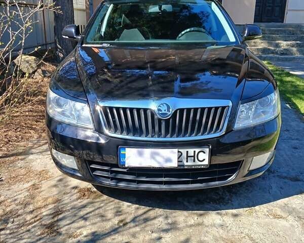 Черный Шкода Октавия, объемом двигателя 1.39 л и пробегом 294 тыс. км за 6400 $, фото 1 на Automoto.ua