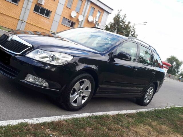 Черный Шкода Октавия, объемом двигателя 1.4 л и пробегом 215 тыс. км за 8200 $, фото 1 на Automoto.ua