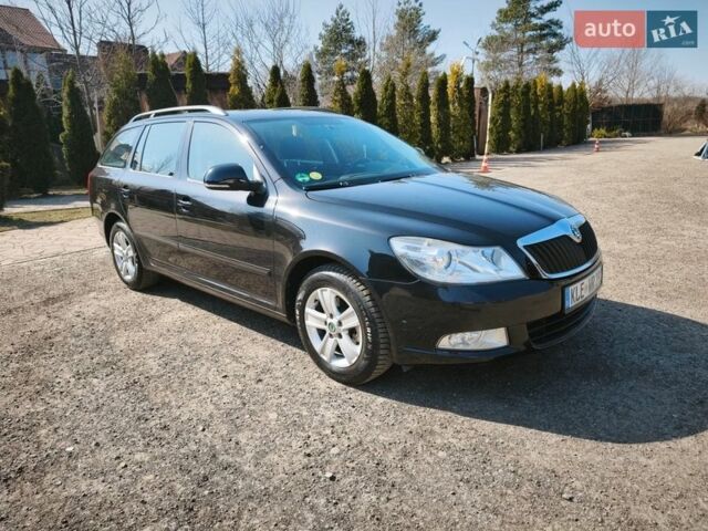 Черный Шкода Октавия, объемом двигателя 1.6 л и пробегом 287 тыс. км за 8600 $, фото 1 на Automoto.ua