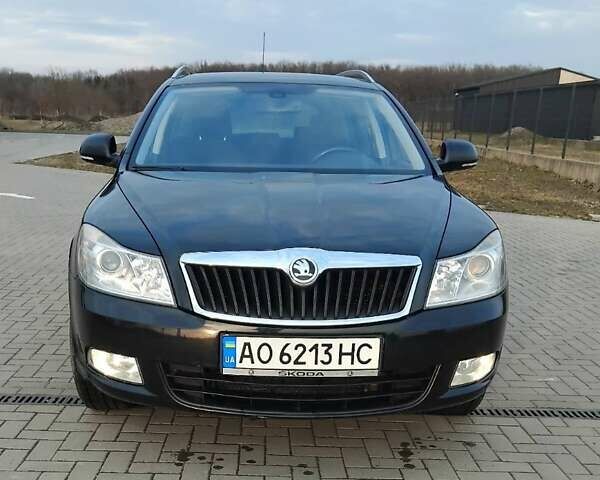 Черный Шкода Октавия, объемом двигателя 1.39 л и пробегом 236 тыс. км за 6300 $, фото 1 на Automoto.ua