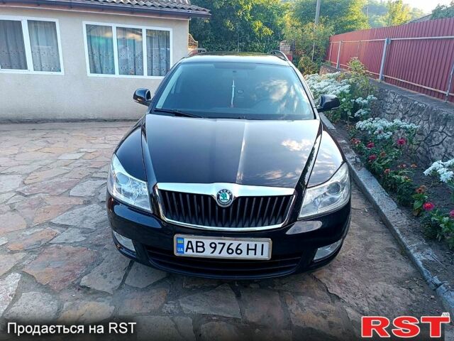 Черный Шкода Октавия, объемом двигателя 1.6 л и пробегом 170 тыс. км за 7400 $, фото 1 на Automoto.ua