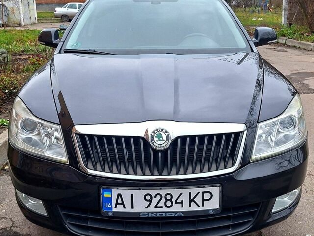 Черный Шкода Октавия, объемом двигателя 1.4 л и пробегом 232 тыс. км за 5950 $, фото 1 на Automoto.ua