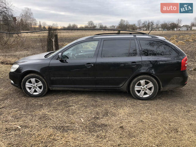Черный Шкода Октавия, объемом двигателя 1.8 л и пробегом 205 тыс. км за 6400 $, фото 1 на Automoto.ua