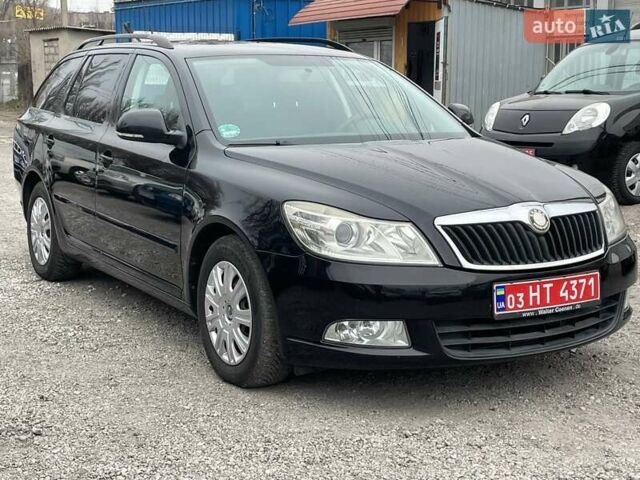 Черный Шкода Октавия, объемом двигателя 1.6 л и пробегом 176 тыс. км за 7550 $, фото 1 на Automoto.ua