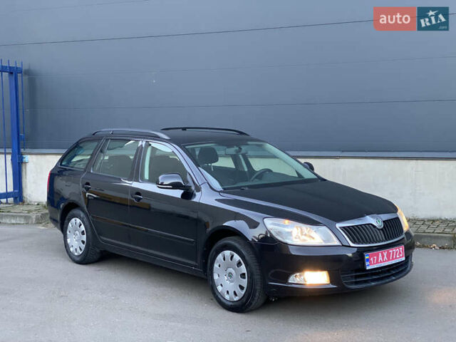 Черный Шкода Октавия, объемом двигателя 1.6 л и пробегом 180 тыс. км за 7700 $, фото 1 на Automoto.ua