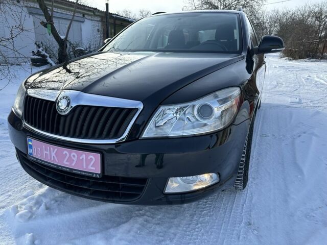 Черный Шкода Октавия, объемом двигателя 1.4 л и пробегом 147 тыс. км за 7400 $, фото 1 на Automoto.ua