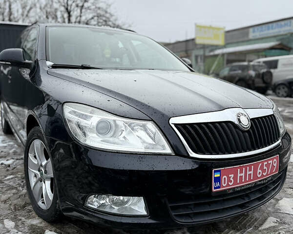 Черный Шкода Октавия, объемом двигателя 1.4 л и пробегом 190 тыс. км за 7750 $, фото 1 на Automoto.ua