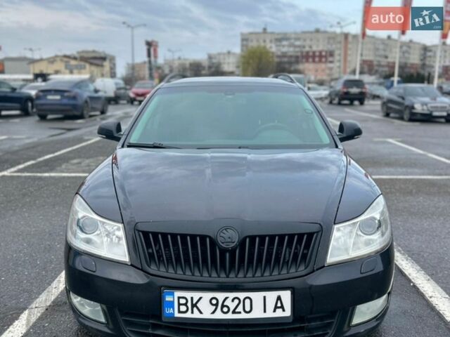 Черный Шкода Октавия, объемом двигателя 1.8 л и пробегом 320 тыс. км за 7500 $, фото 1 на Automoto.ua