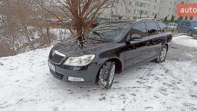 Черный Шкода Октавия, объемом двигателя 1.8 л и пробегом 147 тыс. км за 8000 $, фото 1 на Automoto.ua