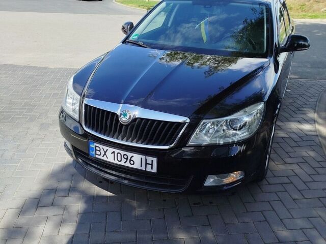 Чорний Шкода Октавія, об'ємом двигуна 1.39 л та пробігом 259 тис. км за 7300 $, фото 1 на Automoto.ua
