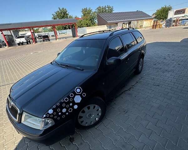 Черный Шкода Октавия, объемом двигателя 1.9 л и пробегом 290 тыс. км за 6600 $, фото 1 на Automoto.ua