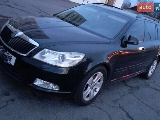 Черный Шкода Октавия, объемом двигателя 1.4 л и пробегом 183 тыс. км за 8000 $, фото 1 на Automoto.ua