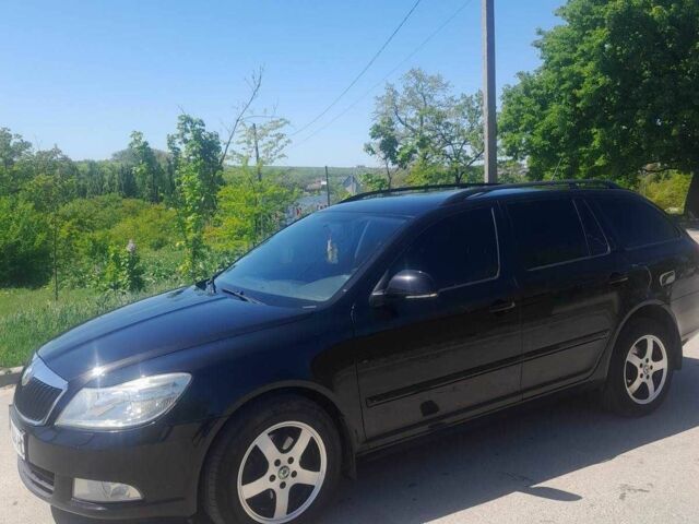 Черный Шкода Октавия, объемом двигателя 2 л и пробегом 233 тыс. км за 8969 $, фото 1 на Automoto.ua