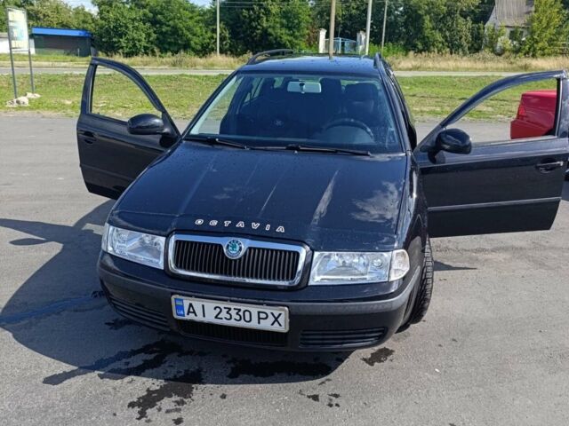 Черный Шкода Октавия, объемом двигателя 1.6 л и пробегом 174 тыс. км за 6800 $, фото 1 на Automoto.ua