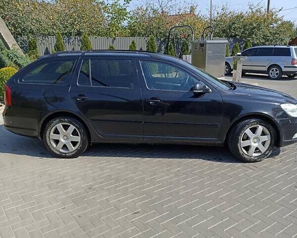 Черный Шкода Октавия, объемом двигателя 1.99 л и пробегом 410 тыс. км за 8000 $, фото 1 на Automoto.ua