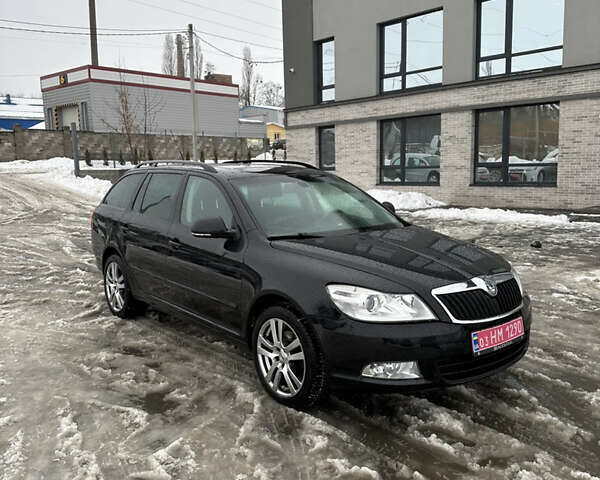 Черный Шкода Октавия, объемом двигателя 2 л и пробегом 241 тыс. км за 8800 $, фото 1 на Automoto.ua
