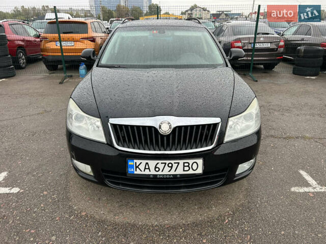 Черный Шкода Октавия, объемом двигателя 1.8 л и пробегом 202 тыс. км за 6999 $, фото 1 на Automoto.ua
