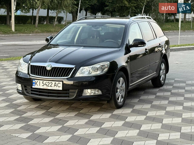 Черный Шкода Октавия, объемом двигателя 1.39 л и пробегом 227 тыс. км за 7550 $, фото 1 на Automoto.ua