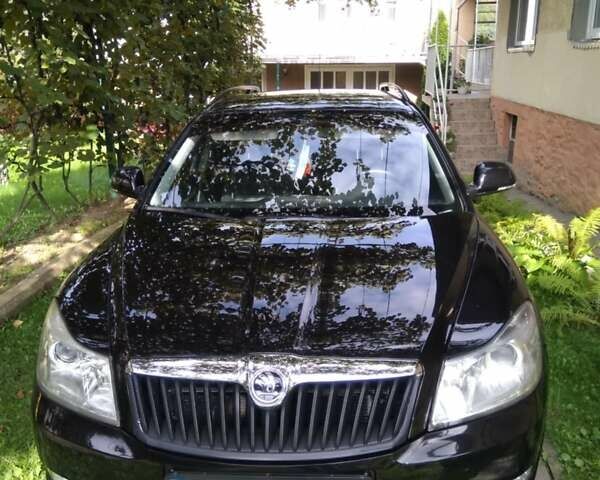 Черный Шкода Октавия, объемом двигателя 1.6 л и пробегом 265 тыс. км за 7650 $, фото 1 на Automoto.ua