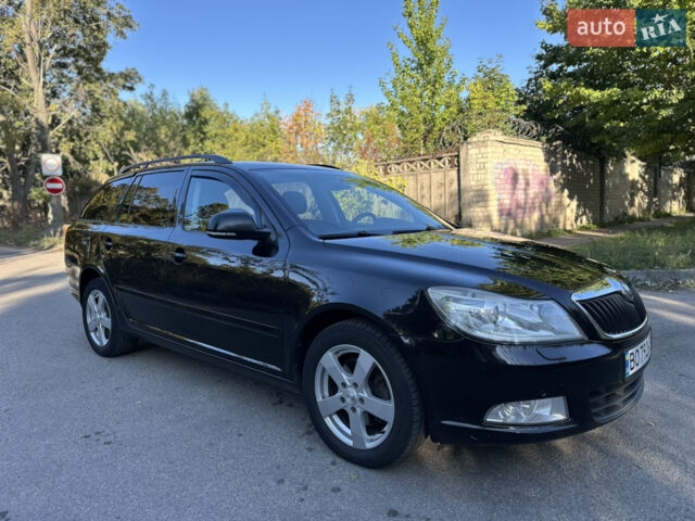 Черный Шкода Октавия, объемом двигателя 1.8 л и пробегом 318 тыс. км за 7000 $, фото 1 на Automoto.ua