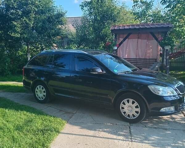 Чорний Шкода Октавія, об'ємом двигуна 1.2 л та пробігом 215 тис. км за 6300 $, фото 1 на Automoto.ua