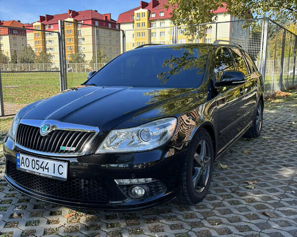 Шкода Октавия 2010 в Мукачеве на Automoto.ua Черный Шкода Октавия, объемом двигателя 1.98 л и пробегом 220 тыс. км за 9000 $, фото 1 на Automoto.ua