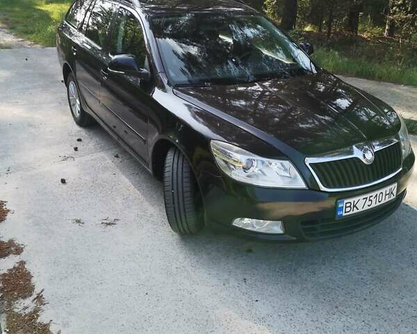 Чорний Шкода Октавія, об'ємом двигуна 1.6 л та пробігом 240 тис. км за 8800 $, фото 1 на Automoto.ua