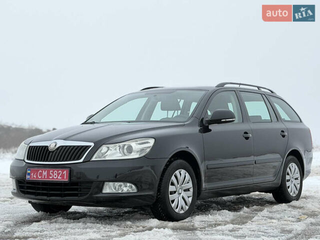 Черный Шкода Октавия, объемом двигателя 1.6 л и пробегом 201 тыс. км за 8599 $, фото 1 на Automoto.ua