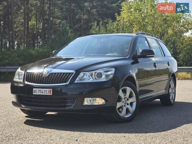 Черный Шкода Октавия, объемом двигателя 1.6 л и пробегом 212 тыс. км за 9299 $, фото 1 на Automoto.ua