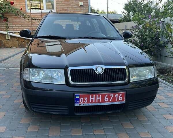 Черный Шкода Октавия, объемом двигателя 1.6 л и пробегом 198 тыс. км за 6700 $, фото 1 на Automoto.ua