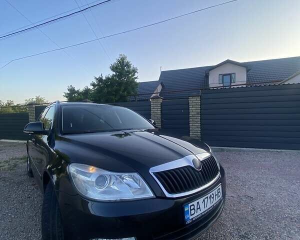 Черный Шкода Октавия, объемом двигателя 1.4 л и пробегом 200 тыс. км за 7700 $, фото 1 на Automoto.ua