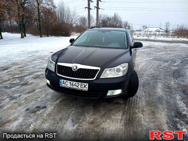 Черный Шкода Октавия, объемом двигателя 2 л и пробегом 330 тыс. км за 8900 $, фото 1 на Automoto.ua