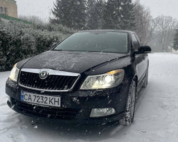Чорний Шкода Октавія, об'ємом двигуна 1.6 л та пробігом 184 тис. км за 9300 $, фото 1 на Automoto.ua