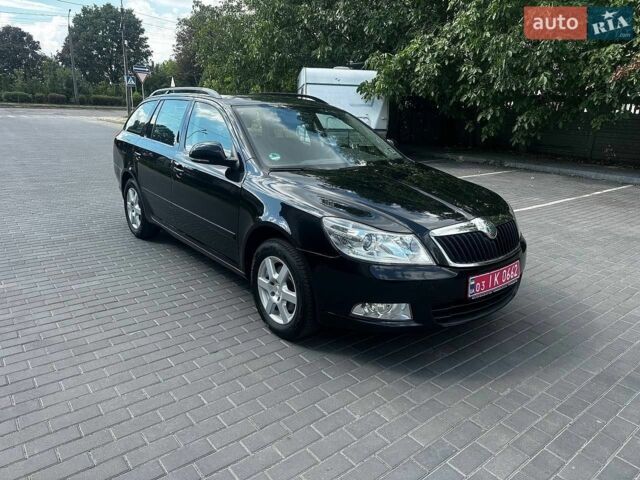 Черный Шкода Октавия, объемом двигателя 1.4 л и пробегом 166 тыс. км за 6699 $, фото 1 на Automoto.ua