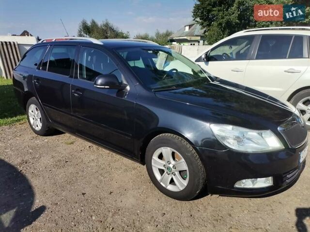 Черный Шкода Октавия, объемом двигателя 1.6 л и пробегом 234 тыс. км за 8500 $, фото 1 на Automoto.ua