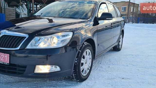 Черный Шкода Октавия, объемом двигателя 1.6 л и пробегом 269 тыс. км за 7450 $, фото 1 на Automoto.ua
