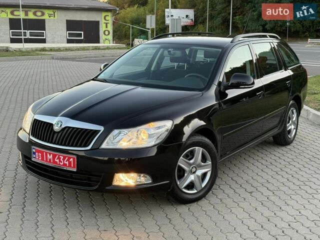 Черный Шкода Октавия, объемом двигателя 1.6 л и пробегом 124 тыс. км за 8600 $, фото 1 на Automoto.ua