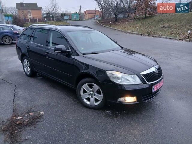Чорний Шкода Октавія, об'ємом двигуна 1.4 л та пробігом 201 тис. км за 8699 $, фото 1 на Automoto.ua
