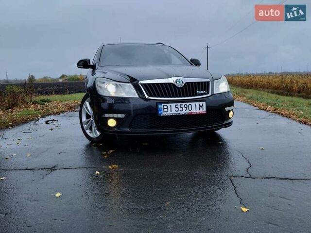 Черный Шкода Октавия, объемом двигателя 2 л и пробегом 220 тыс. км за 10500 $, фото 1 на Automoto.ua